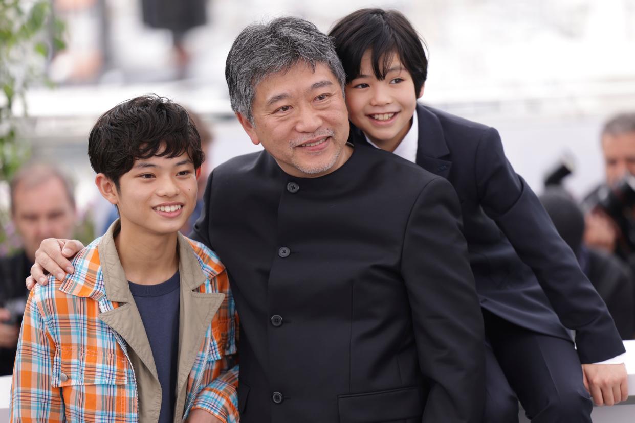 Soya Kurokawa, from left, director Hirokazu Koreeda, and Hinata Hiiragi pose for photographers at the photo call for the film 'Monster' at the 76th international film festival, Cannes, southern France, Thursday, May 18, 2023. (Photo by Vianney Le Caer/Invision/AP)