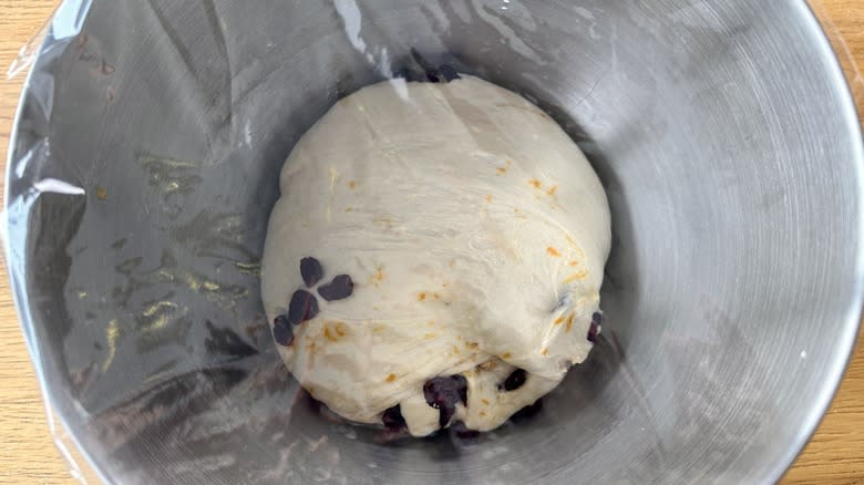 covered cranberry dough in bowl