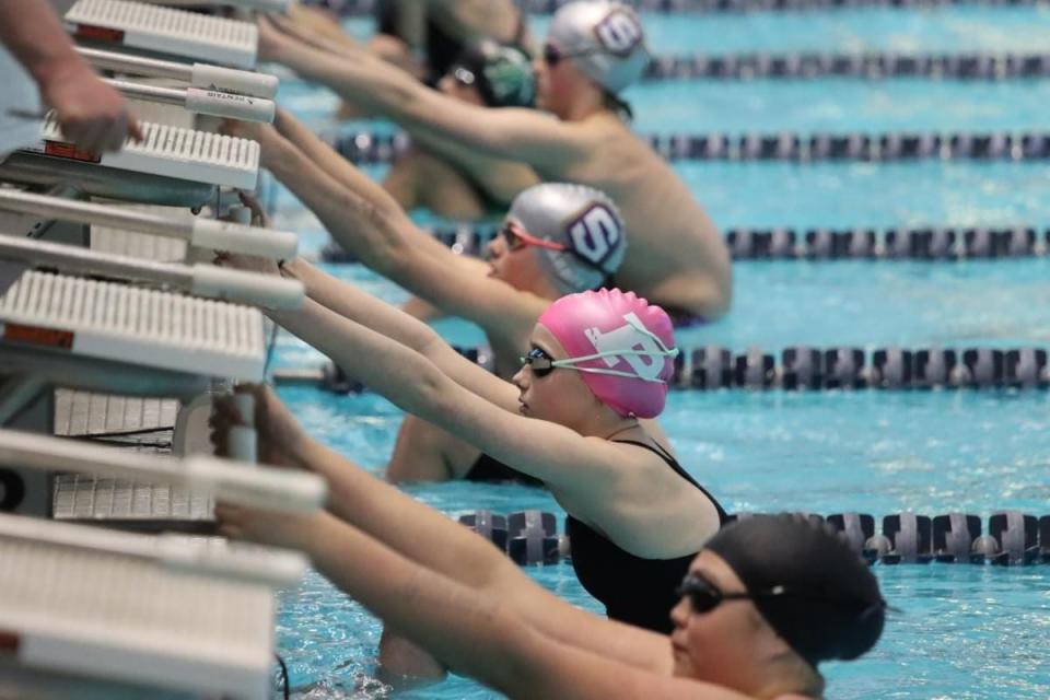 PAWS swimmer Lillian Lucht gets set to compete during the Greater Iowa Swim League State Meet on Saturday, March 9, 2024, in Des Moines.