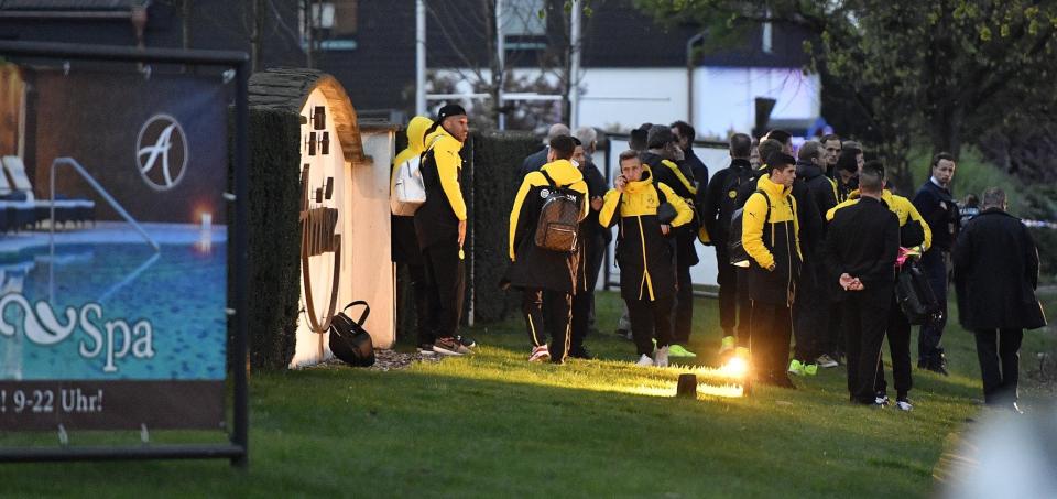 <p>Dortmund players stand outside the team hotel after the team bus was damaged in an explosion before the Champions League quarterfinal soccer match between Borussia Dortmund and AS Monaco in Dortmund, western Germany, Tuesday, April 11, 2017. (AP Photo/Martin Meissner) </p>