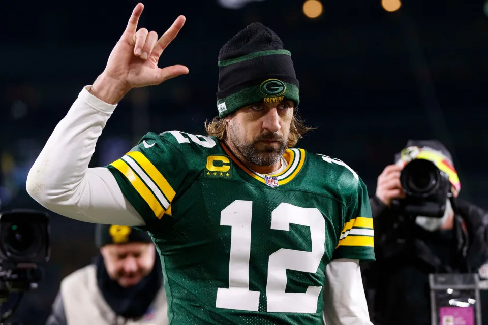 Aaron Rodgers walks off the field following the Packers' win over the Bears at Lambeau Field.