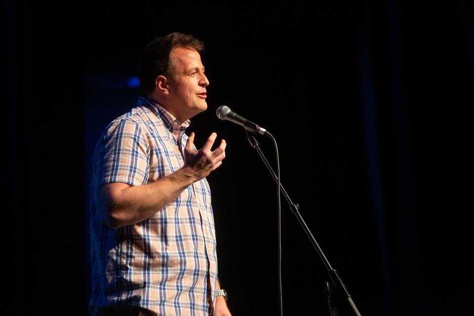 Tony Dahlman performs at the "Growing Up" themed Storytellers event at Hoyt Sherman Place in Des Moines, Tuesday, April 26, 2022.