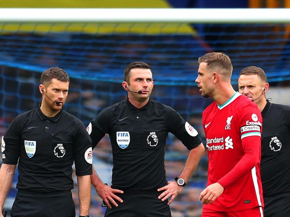 Jordan Henderson speaks with match officials after his goal is disallowed (Getty)