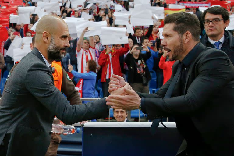 Pep Guardiola y Diego Simeone. UEFA Champions League