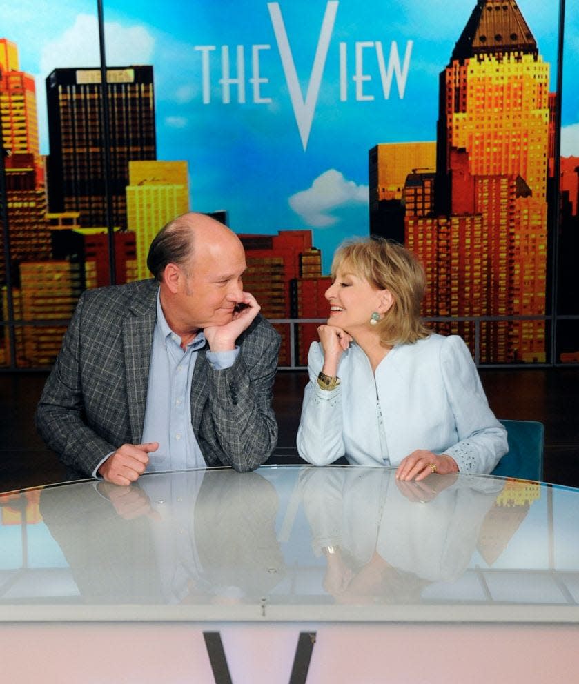 Bill Geddie and Barbara Walters appear on the set of "The View" on May 8, 2012, in New York.