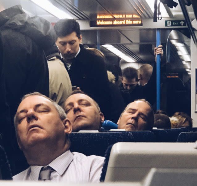 The remarkable photo shows three sleeping commuters who appear to be the same person. Source: Reddit/ thrashbandit