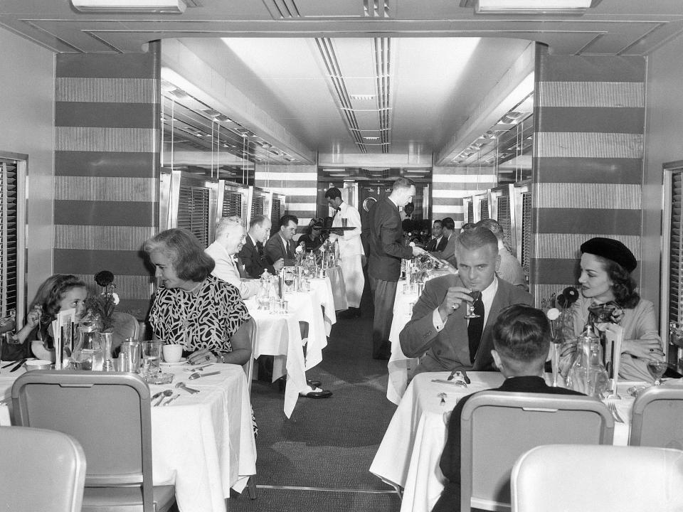 9/2/1948-New York, NY-: This is one of the new dining cars which will go into service September 17th, on the New York Central Railroad's Twentieth Century Limited. Built by the Pullman-Standard Car Manufacturing Company, with interior design by Henry Dreyfuss, the new diner is divided into four distinctive dining sections, seating 64 persons at tables, a lounging ante-room and a steward's office.