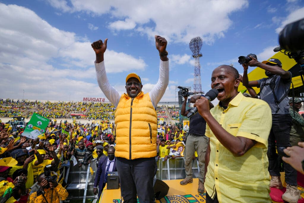 Kenyan presidential candidate William Ruto greets supporters at his final electoral campaign rally at Nyayo stadium in Nairobi, Kenya Saturday, Aug. 6, 2022. (AP Photo/Ben Curtis)