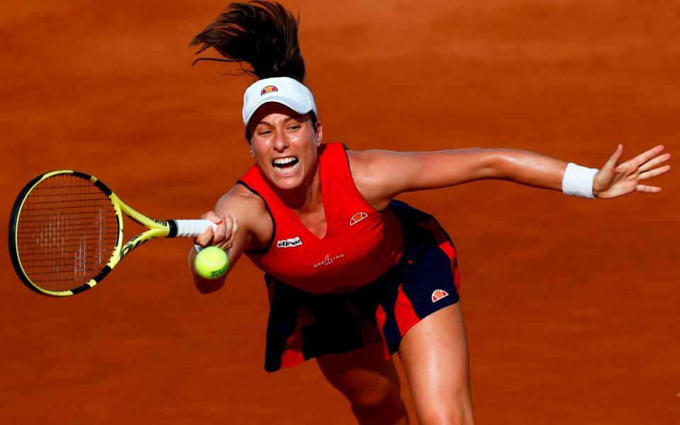 Britain's Johanna Konta plays a forehand to Spain's Garbine Muguruza during their round 3 match on day five of the Women's Italian Open at Foro Italico on September 18, 2020 in Rome, Italy - AFP /ANGELO CARCONI 