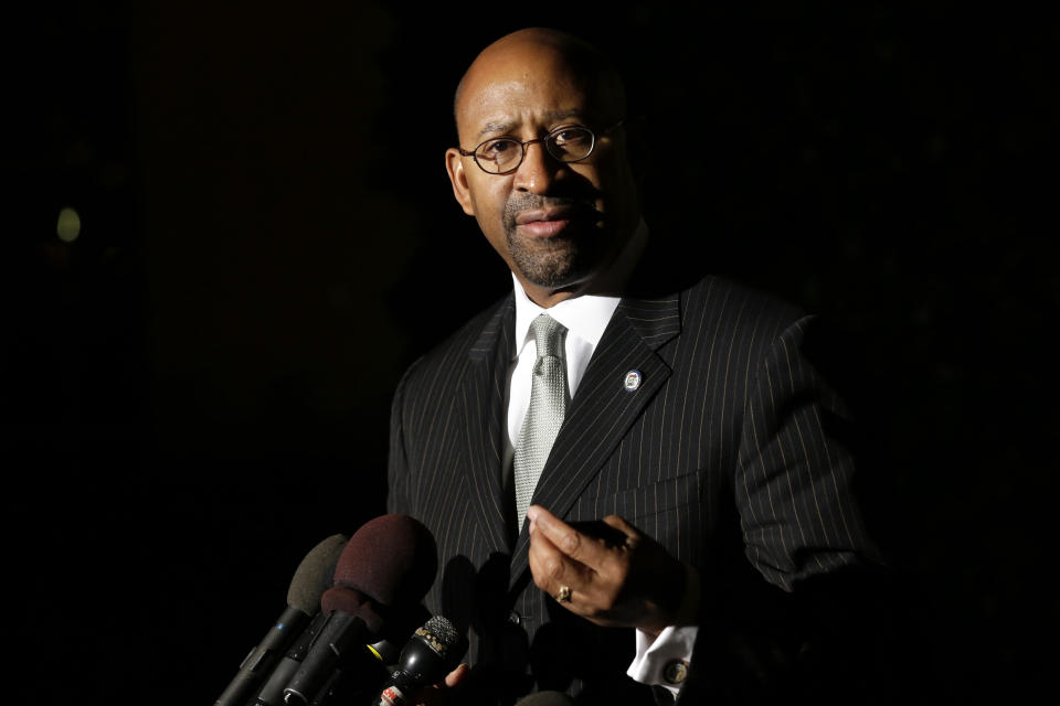 Philadelphia Mayor Michael Nutter speaks to the media outside of the White House, after Vice President Biden met with mayors from cities across the country to talk about taxes and the economy, in Washington, Thursday, Nov. 15, 2012. (AP Photo/Jacquelyn Martin)