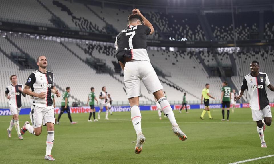 Cristiano Ronaldo celebrates after scoring one of two penalties against Atalanta.