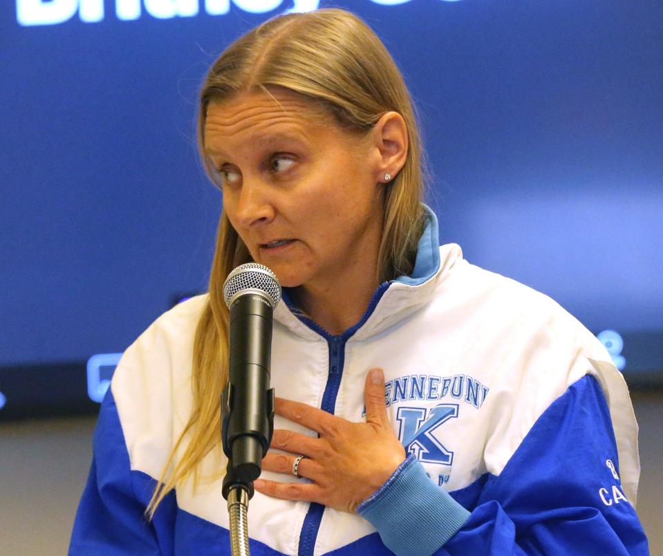 Beth T. Fossett wears her 30-year-old swimming jacket she proudly earned when she went to Kennebunk High School. She speaks in a concerned manner to the RSU 21 School Board May 10, 2024.