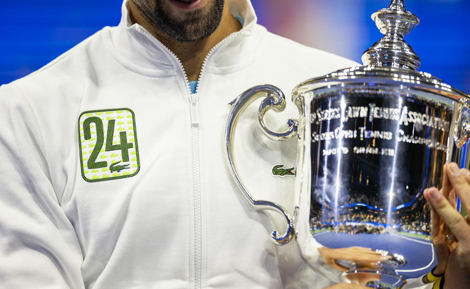 Novak Djokovic, pictured here in his '24' jacket after winning the US Open.