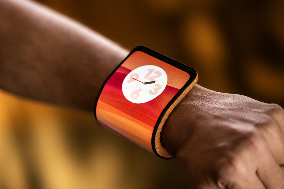 Motorola's adaptive display wrapped around a person's wrist like a watch