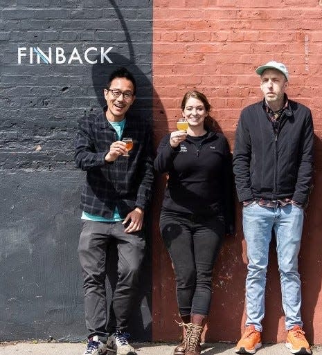 Basil Lee, left and Kevin Stafford, right hosted Narragansett Beer brewer Lee Lord at their Queens brewery to make a collaboration beer named Neighbor Neighbor. It also has Newport Salt in the beer.