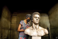 Fredrika Newton, widow of Black Panther Party co-founder Huey Newton, touches a bust of her late husband at Artworks Foundry on Tuesday, Aug. 10, 2021, in Berkeley, Calif. The bust is scheduled to be unveiled in Oakland on Sunday, Oct. 24, the first permanent public art piece honoring the party in the city of its founding. (AP Photo/Noah Berger)