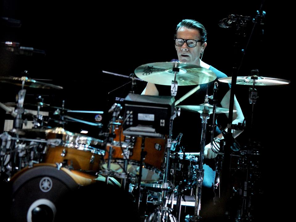 Larry Mullen Jr. behind the drums at a U2 concert in 2018.