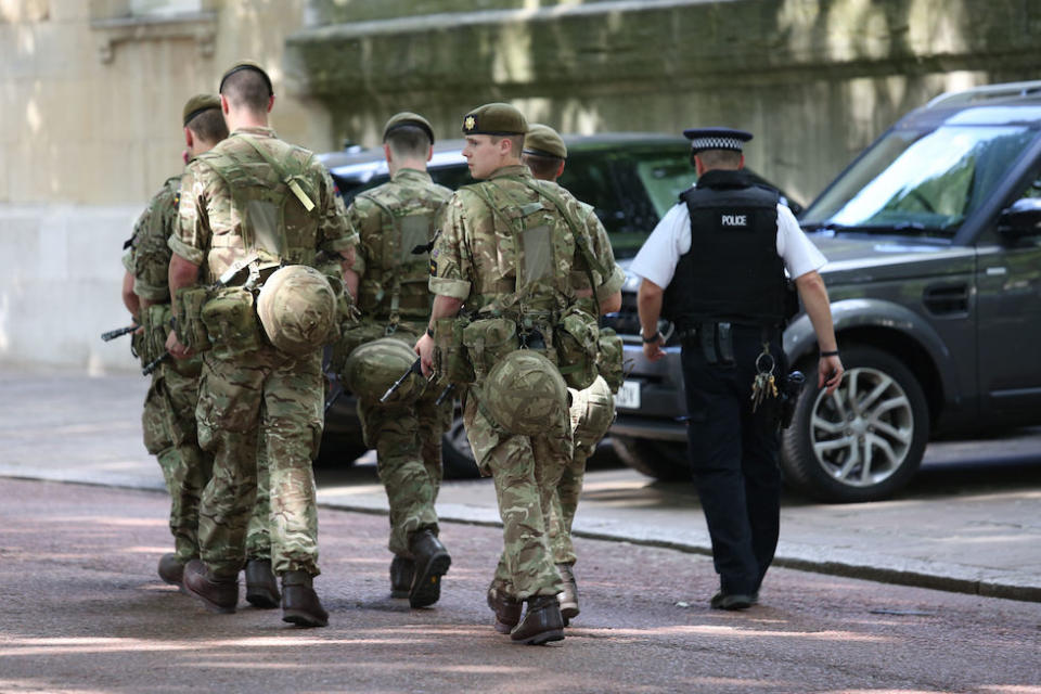 Soldiers join police officers outside Buckingham Palace under Operation Temperer after the Parsons Green Tube bombing in September 2017 (Picture: PA)