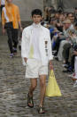 A model wears a creation as part of the Hermes men's Spring Summer 2023 collection presented in Paris, France, Saturday, June 25, 2022. (AP Photo/Francois Mori)