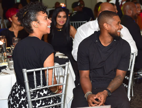 Usher with Grace Miguel at an event in July. (Getty Images)