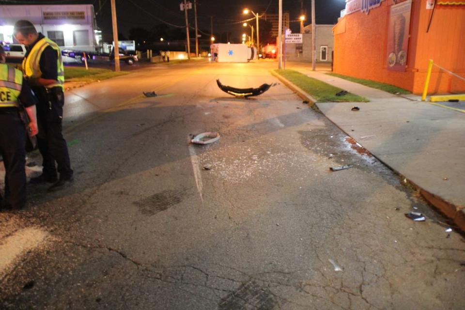 A Kansas City ambulance lies on its side after being struck by a Jackson County sheriff’s deputy who was chasing a driver in August 2017.