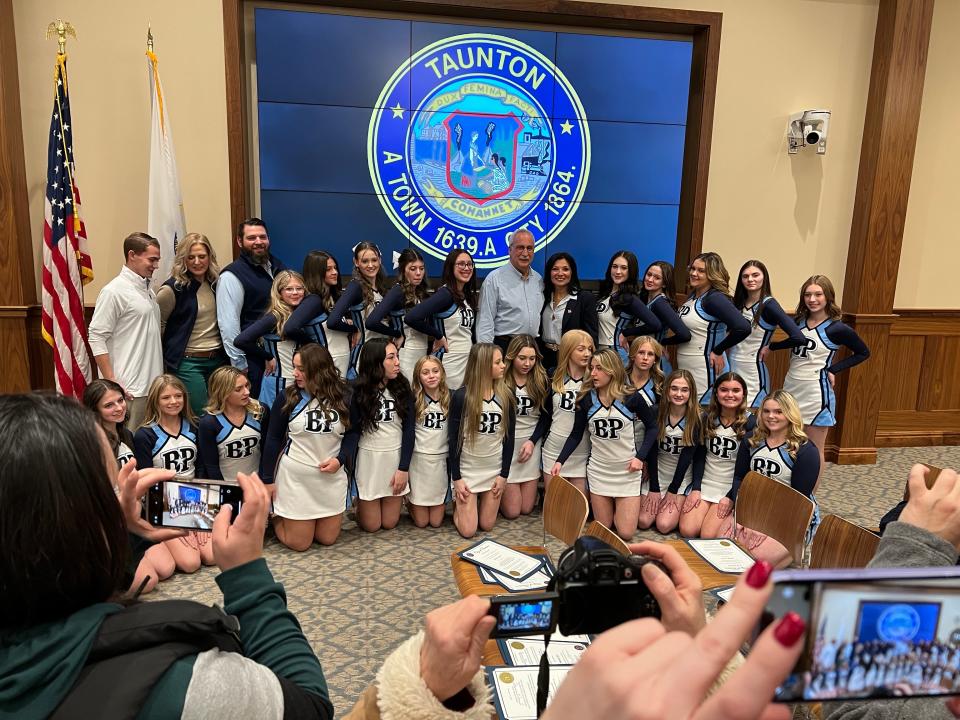 The B-P cheerleading team and coaches had much to smile about on Tuesday, Nov. 29, 2002, after the City Council and Mayor Shaunna O'Connell presented them citations for winning the recent state Game Day championship. Back center are B-P school Committee members Louis Borges and Estele Borges, who is also a Taunton city councilor.