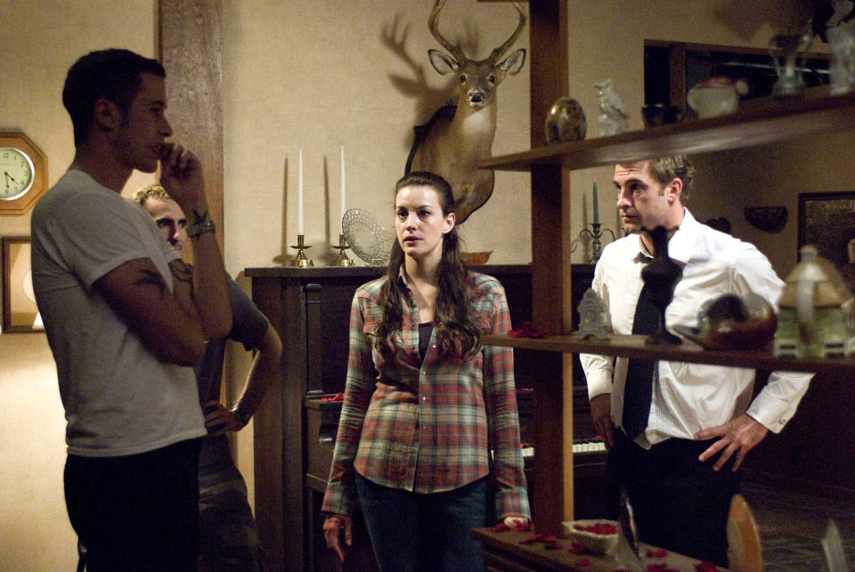 Bryan Bertino (left) with Liv Tyler and Scott Speedman on the set of the original ‘Strangers’ in 2008