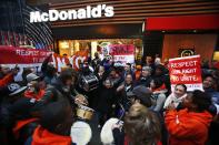 Fast food workers attend a protest against McDonald's outside one of its restaurants in New York, December 5, 2013. (REUTERS/Eduardo Munoz)