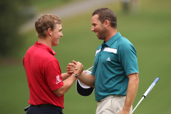 Bud Cauley (L) and Sergio Garcia shake hands on the 18th green during the final round of the Wyndham Championship at Sedgefield Country Club on August 20, 2012 in Greensboro, North Carolina. (Photo by Hunter Martin/Getty Images)