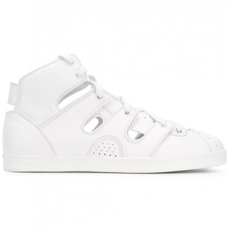 <p><em>White Leather Lace-Up Sneakers, EMPORIO ARMANI (Available at Tessabit), $195</em></p><p><a rel="nofollow noopener" href="https://www.tessabit.com/us/sneakers-209245/" target="_blank" data-ylk="slk:BUY NOW;elm:context_link;itc:0;sec:content-canvas" class="link ">BUY NOW</a></p>