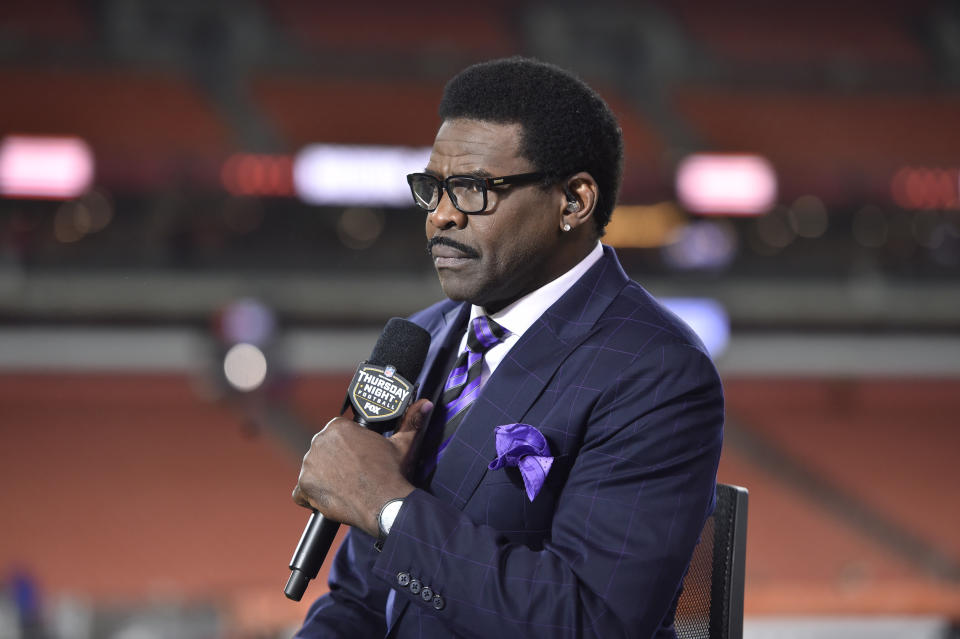 NFLN on air talent Michael Irvin is shown after an NFL football game between the Denver Broncos and the Cleveland Browns, Thursday, Oct. 21, 2021, in Cleveland. (AP Photo/David Richard)