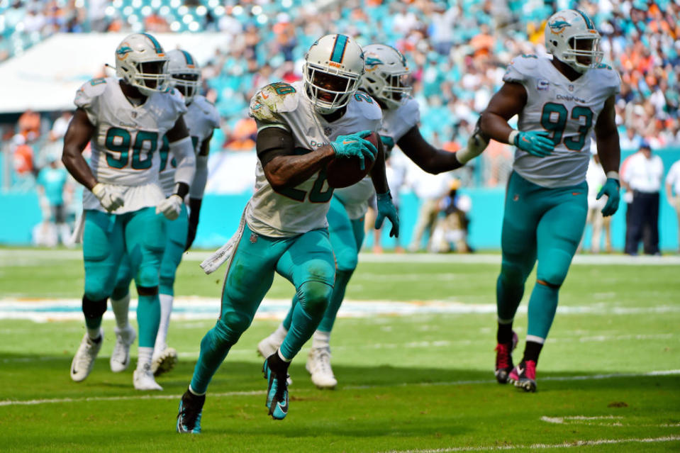 Oct 8, 2017; Miami Gardens, FL, USA; Miami Dolphins free safety Reshad Jones (20) runs the ball in for a touchdown on a fumble recovery of Tennessee Titans quarterback Matt Cassel (16, not pictured) during the first half at Hard Rock Stadium. Mandatory Credit: Jasen Vinlove-USA TODAY Sports