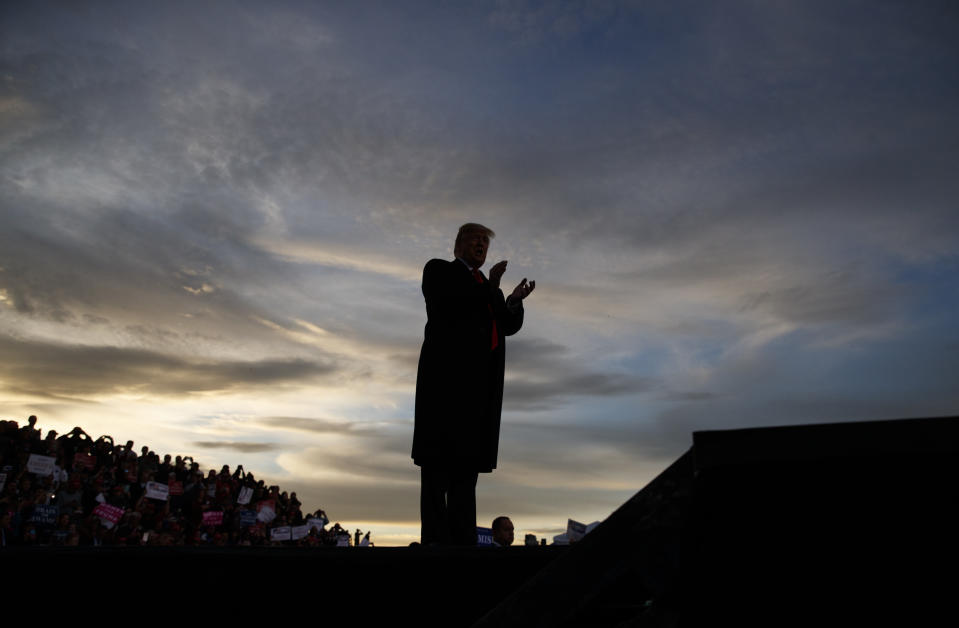 President Donald Trump arrives for a campaign rally at Minuteman Aviation Hangar, Thursday, Oct. 18, 2018, in Missoula, Mont. (AP Photo/Carolyn Kaster)