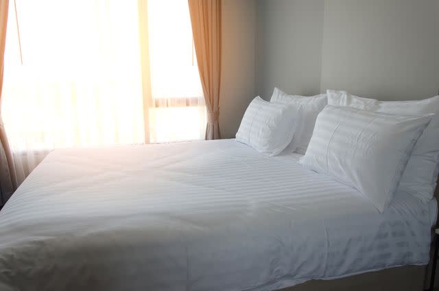<p>Getty</p> Stock image of a queen-sized bed.
