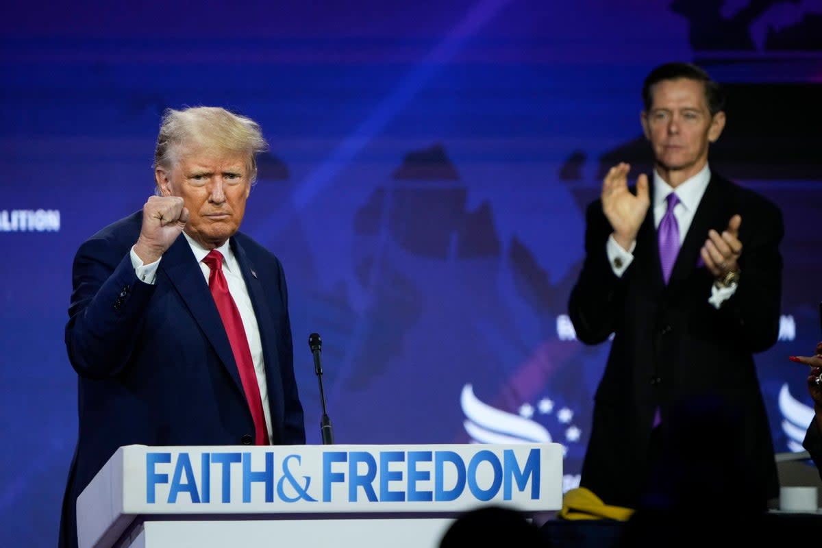 Donald Trump concludes his remarks as Chairman of the Faith and Freedom Coalition Ralph Reed applauds at the Faith and Freedom Road to Majority conference at the Washington Hilton on June 24, 2023 in Washington, DC.  (Getty Images)