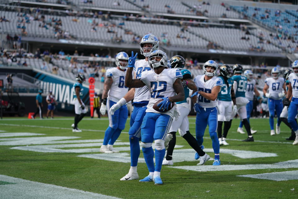Detroit Lions running back D'Andre Swift (32) celebrating a touchdown during a NFL football game against the Jacksonville Jaguars on Sunday, Oct. 18, 2020 in Jacksonville, FL. The Lions defeated the Jaguars 34-16 (Detroit Lions via AP).