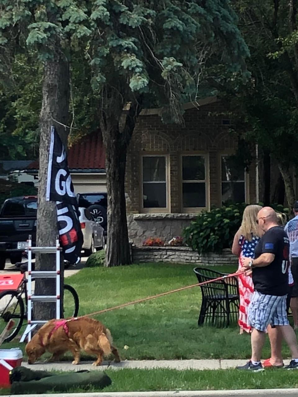 The flag hanging on the tree at village of Hartland trustee Tom Truttschel's home during the Hometown Celebration parade on June 26.