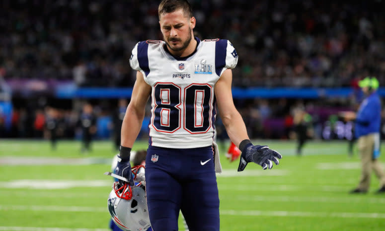 Danny Amendola walking off the field with his helmet off.