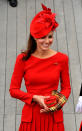 LONDON, ENGLAND - JUNE 03: Catherine, Duchess of Cambridge onboard the Spirit of Chartwell during the Diamond Jubilee Pageant on the River Thames during the Diamond Jubilee Thames River Pageant on June 3, 2012 in London, England. For only the second time in its history the UK celebrates the Diamond Jubilee of a monarch. Her Majesty Queen Elizabeth II celebrates the 60th anniversary of her ascension to the throne. Thousands of well-wishers from around the world have flocked to London to witness the spectacle of the weekend's celebrations. The Queen along with all members of the royal family will participate in a River Pageant with a flotilla of a 1,000 boats accompanying them down The Thames, the star studded free concert at Buckingham Palace, and a carriage procession and a service of thanksgiving at St Paul's Cathedral. (Photo by John Stillwell - WPA Pool/Getty Images)