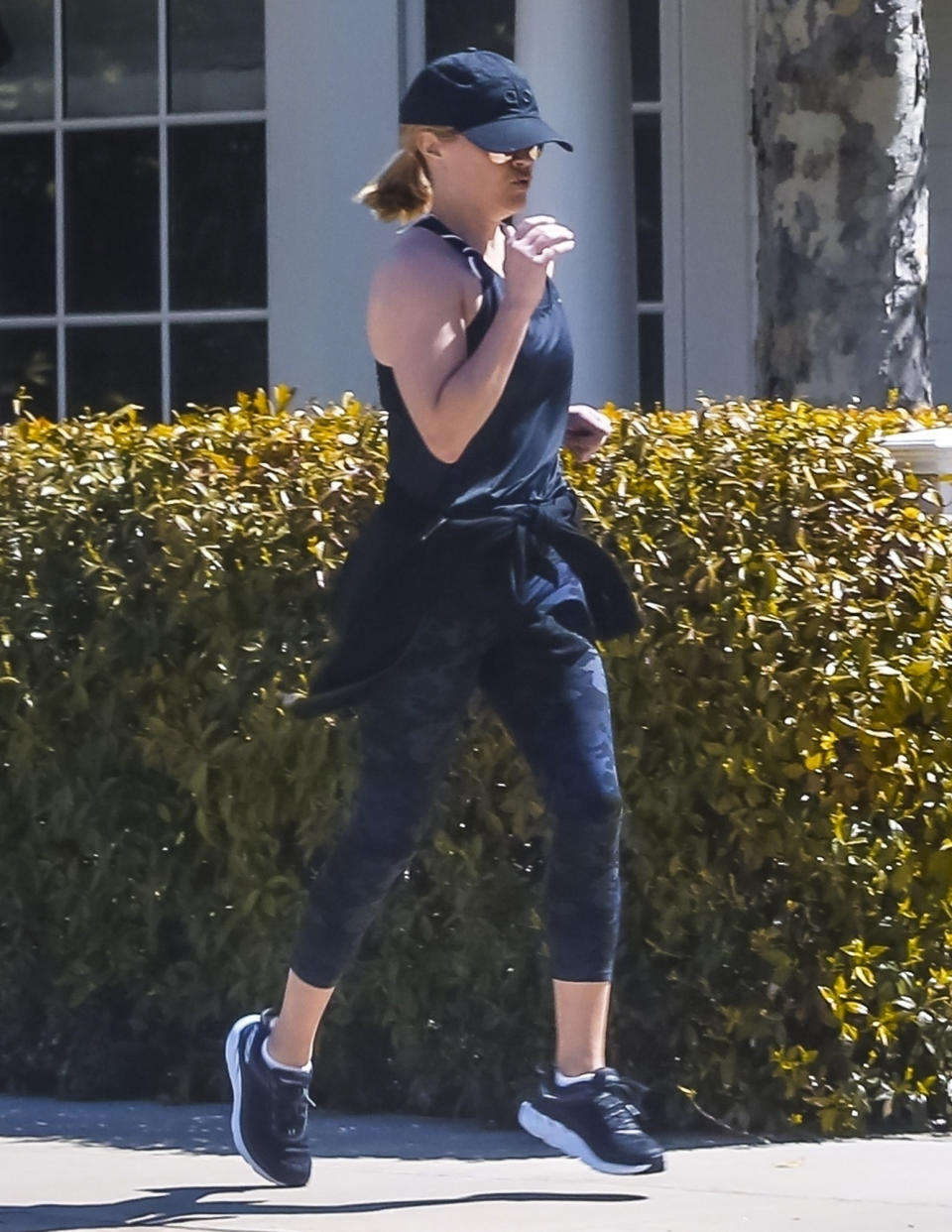 <p>Reese Witherspoon doesn't even touch the ground on Monday while out for a jog in L.A.</p>