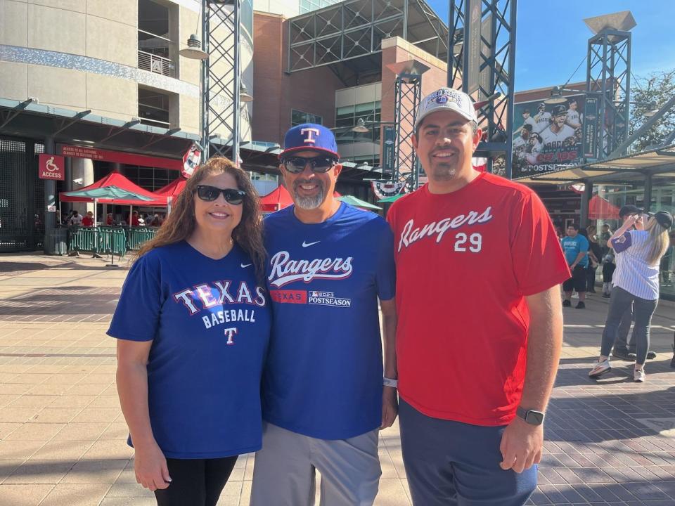 Anna Medel (from left), Rob Medel and Nick Medel attend Game 5 of the World Series between the Arizona Diamondbacks and Texas Rangers on Wednesday, Nov. 1, 2023 at Chase Field in Phoenix.