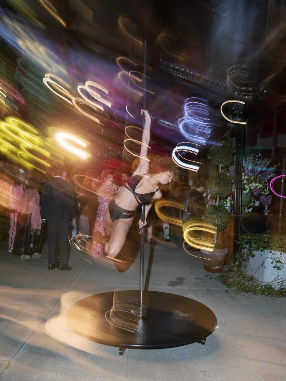 a pole dancer at a wedding