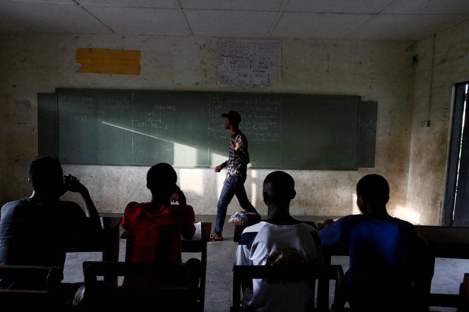 Boys take extra lessons after school hours in Obuasi, Ghana.(Photo: Francis Kokoroko/Reuters)