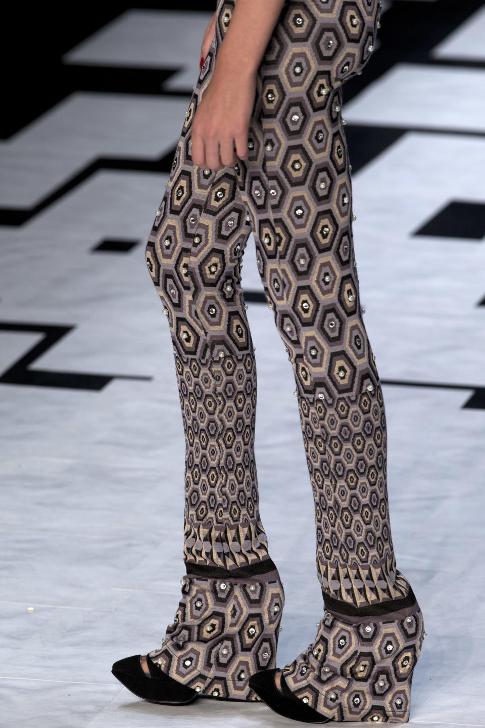 A model wears a creation from the Nica Kessler winter collection during Fashion Rio, in Rio de Janeiro, Brazil, Friday, Nov. 9, 2012. (AP Photo/Silvia Izquierdo)