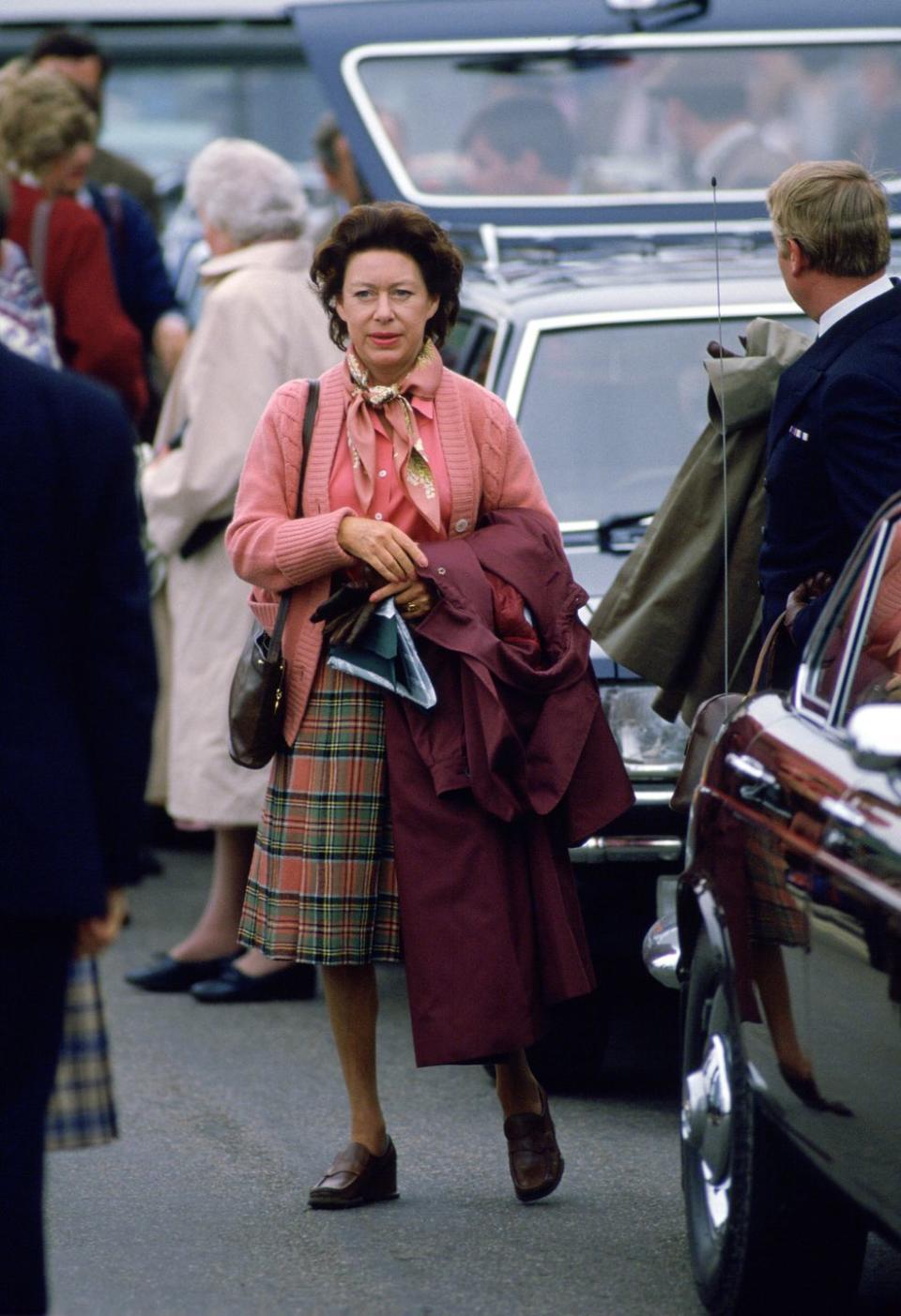 <p>Princess Margaret wears a casual outfit while arriving in Scotland after the Britanna docked in Aberdeen in 1985.</p>