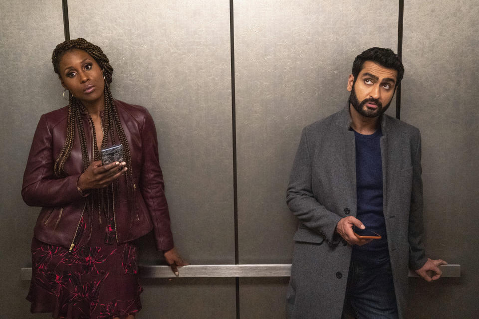 This image released by Netflix shows Issa Rae as Leilani, left, and Kumail Nanjiana as Jibran in a scene from "The Lovebirds." (Skip Bolen/Netflix via AP)