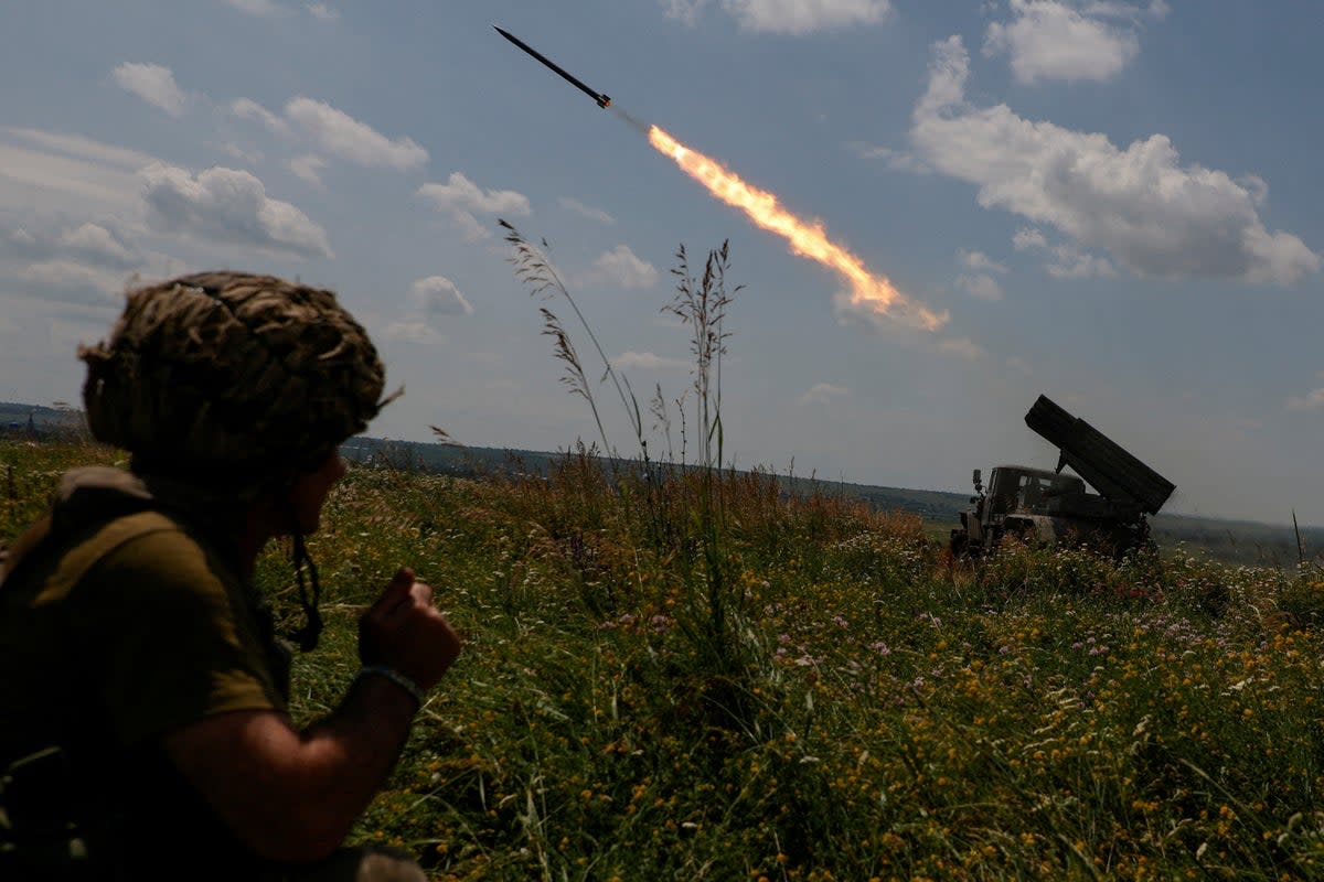 Ukrainian servicemen of the 47th Magura Separate Mechanised Brigade fire a BM-21 Grad multiple launch rocket system towards Russian troops near a front line in Zaporizhzhia region, 25 June 2023 (REUTERS)