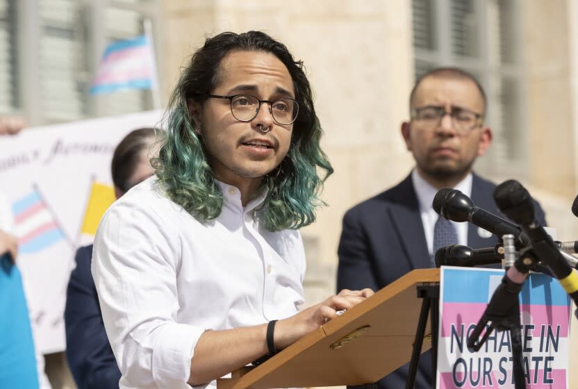 Adri Perez speaks at a rally in support of transgender children and their families