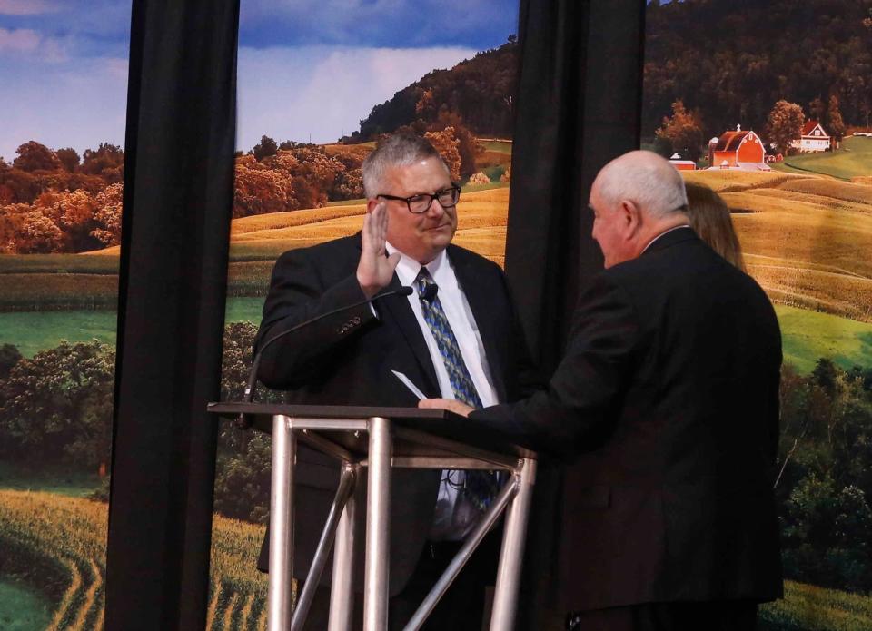 U.S. Agriculture Secretary Sonny Perdue swears in Bill Northey as a USDA undersecretary on Tuesday, March 6, 2018, at the Iowa State Fairgrounds in Des Moines.