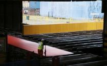 Steel is seen in the rolling mill following the recommissioning of the works by Liberty Steel Group at the Dalzell steel plant in Motherwell, Britain September 28, 2016. REUTERS/Russell Cheyne